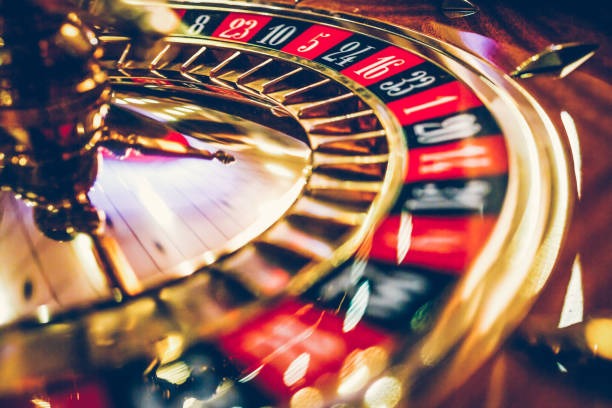 Roulette live wheel with ball and betting layout on mama table